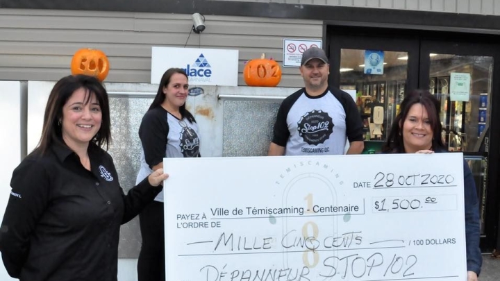 Stop 102 convenience store donates $1500