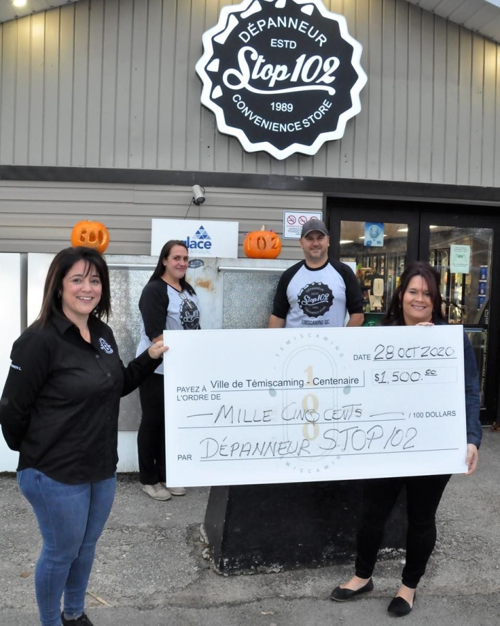 Stop 102 convenience store donates $1500